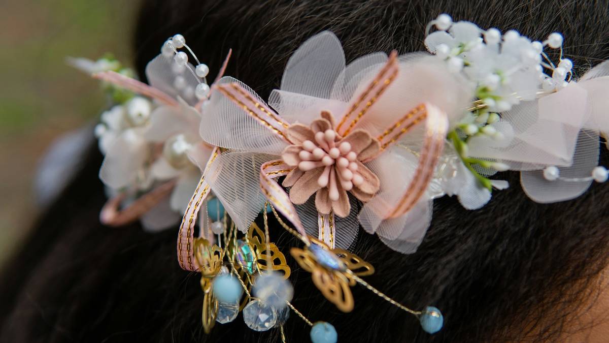 Handcrafted hair barrettes showcasing intricate Decorative Designs on velvet display
